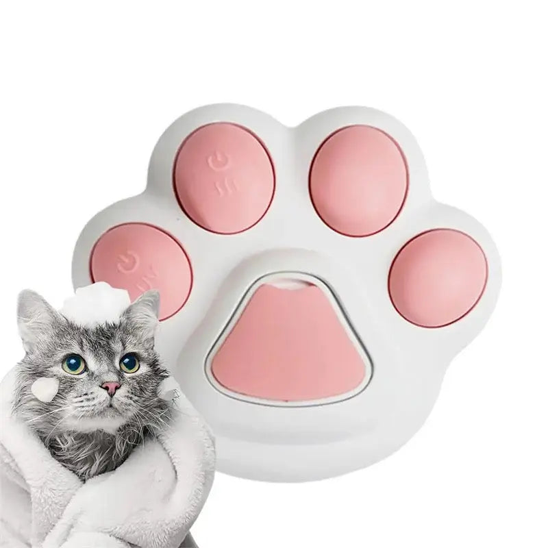 Cat paw-shaped toy with a cat next to it on a white background