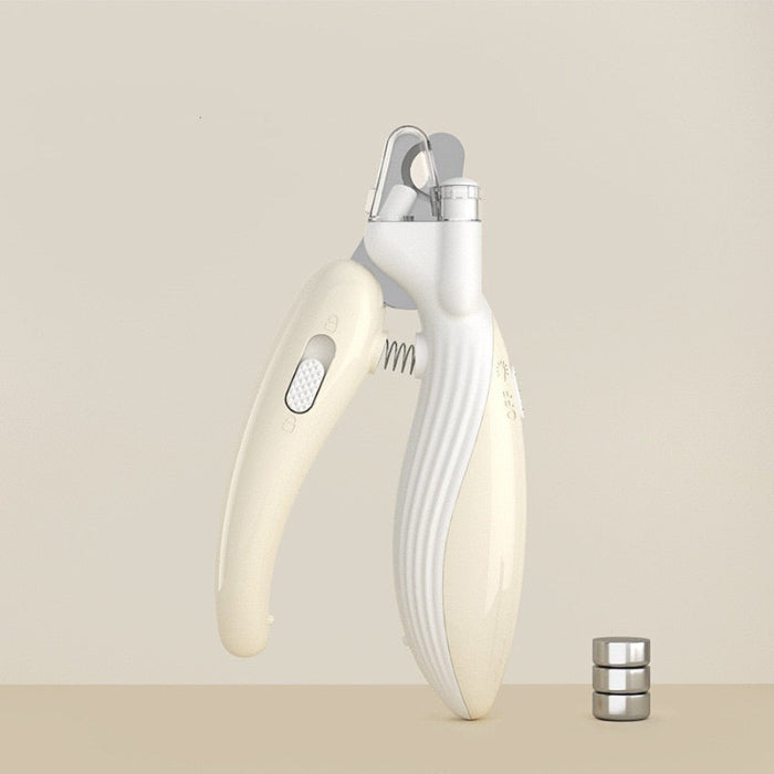 Cream Pet Nail Clipper on a beige background