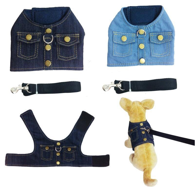 Denim dog vest, harness, and leash set with a plush dog toy wearing the vest on a white background.