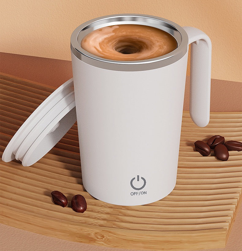 White mug with a power symbol on a wooden surface with coffee beans