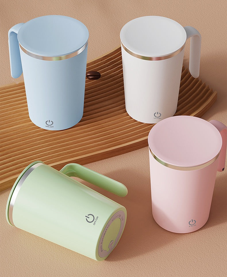 Four colorful mugs with handles on a wooden tray against a beige background