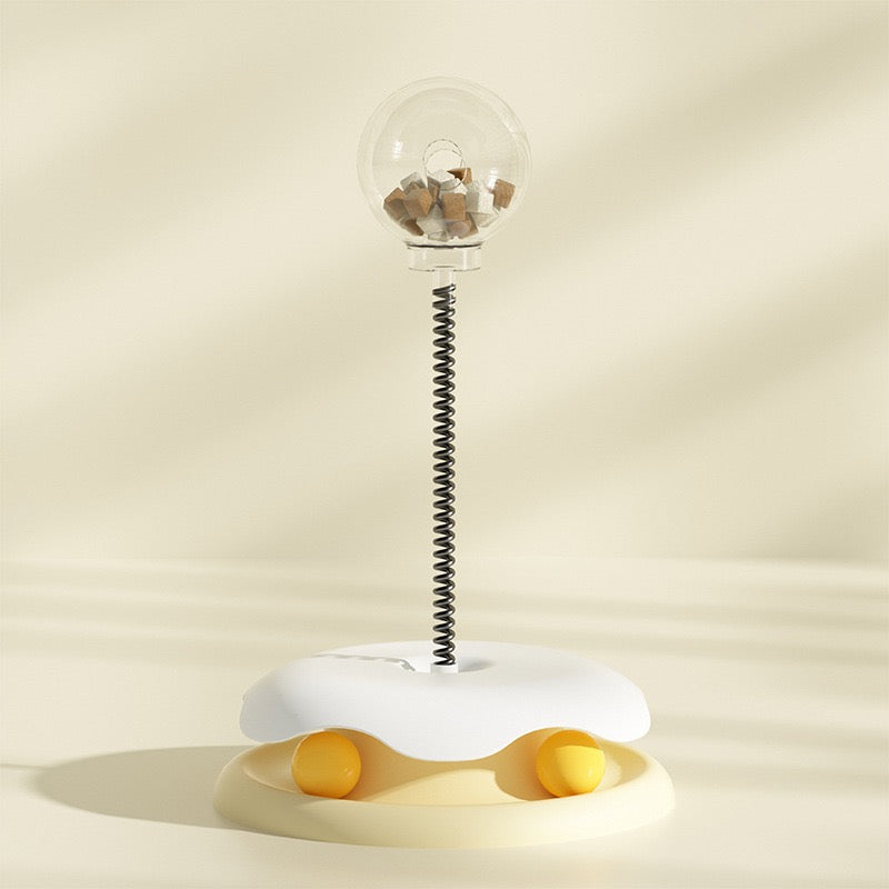 Modern Cat Toy with a flexible neck on a beige background