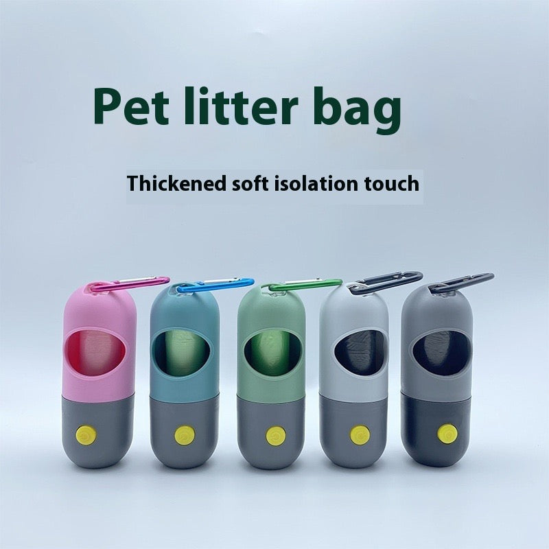 Five pet litter bags in different colors with a gray base on a light blue background.