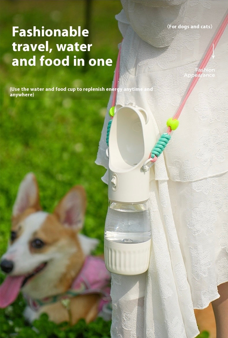 Portable water and food cup for pets with a dog in the background