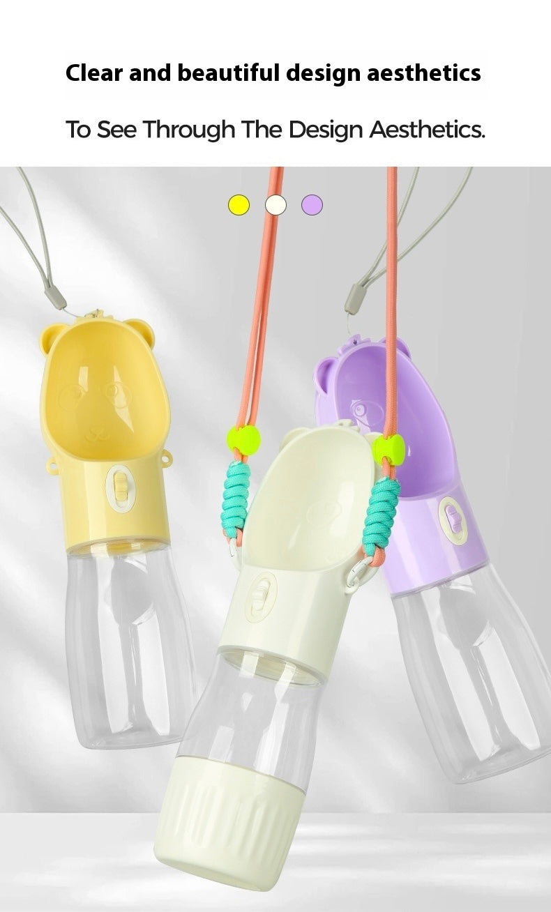 Three colorful pet water bottles with hanging loops on a light gray background.