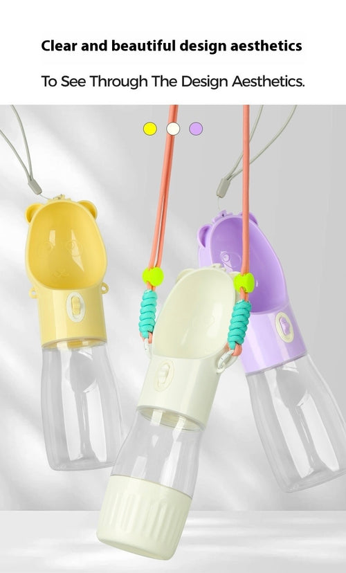 Three colorful pet water bottles with hanging loops on a light gray background.