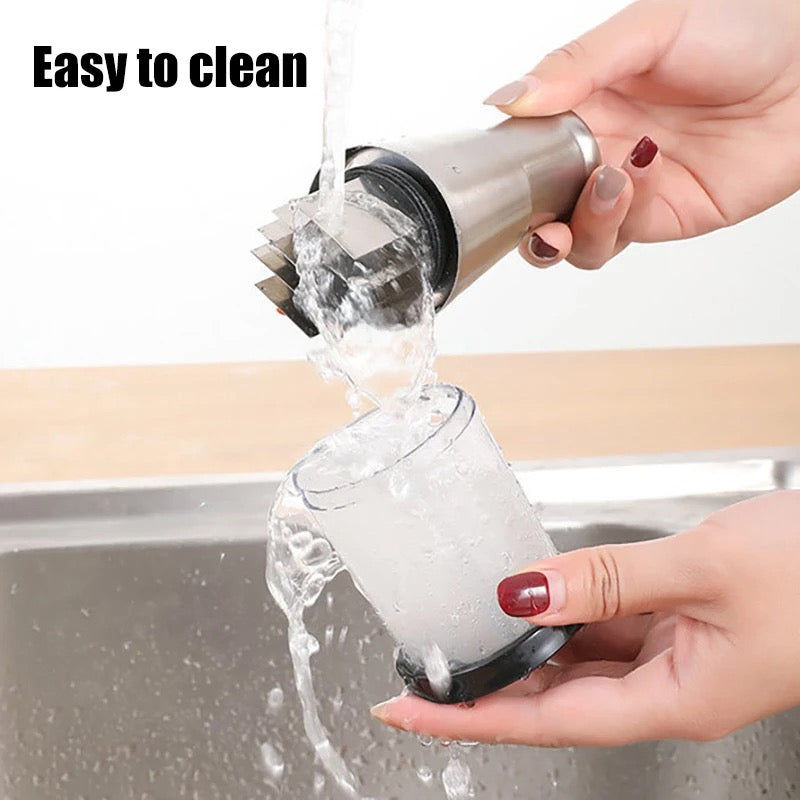 Person washing a garlic crusher with a cleaning tool over a sink, with text 'Easy to clean' above.