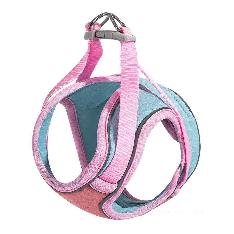 Pink and blue pet harness with a leash on a white background