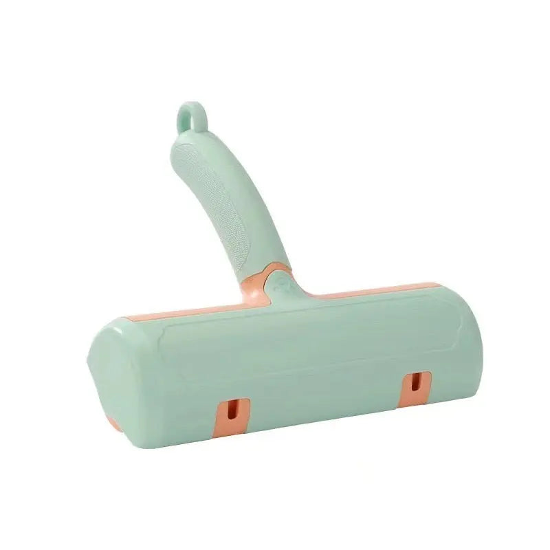 Mint green and pink pet hair remover on a white background