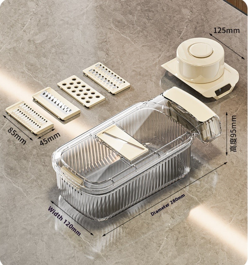 Kitchen slicer with interchangeable blades on a gray surface