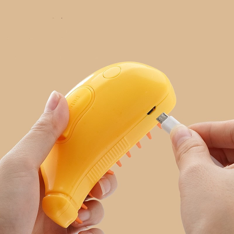 Yellow electronic device with a USB cable being inserted on a beige background