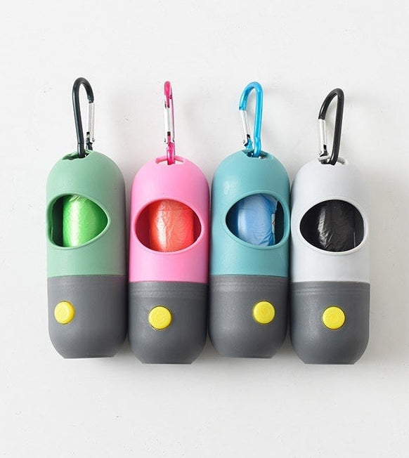 Four colorful pet treat dispensers with carabiners on a white background