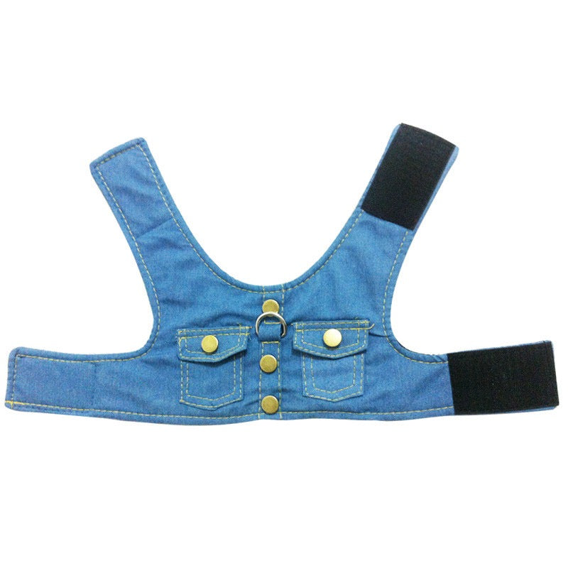 Blue denim dog harness with black straps on a white background