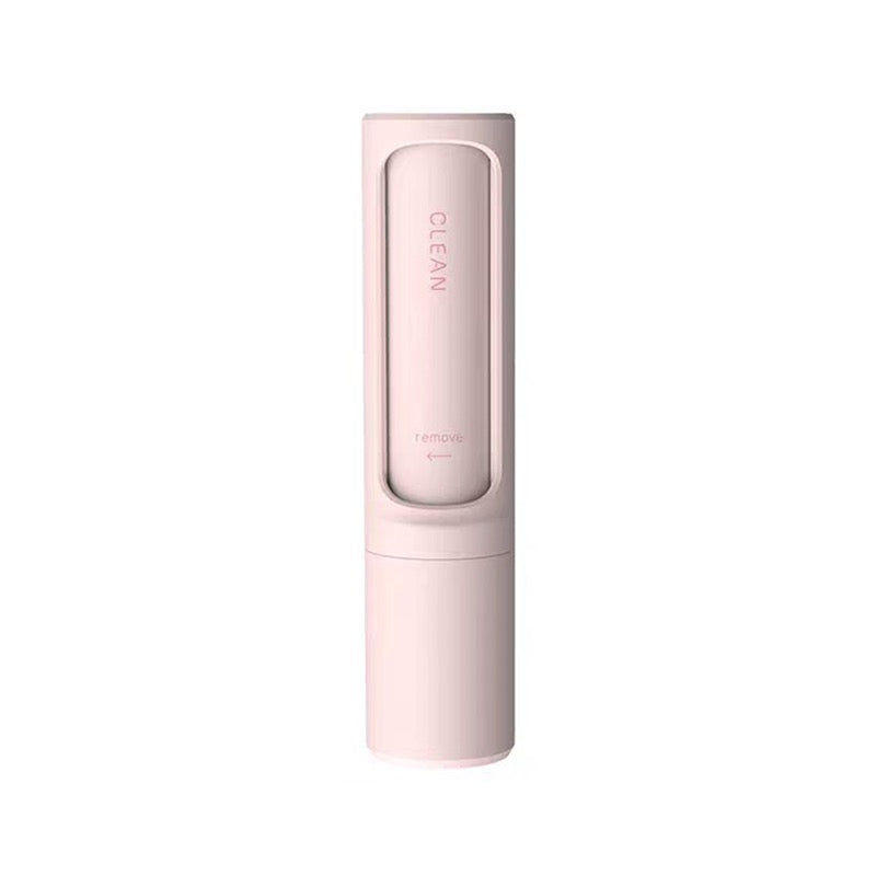 Pink Lint roller with 'INVADO' branding on a white background