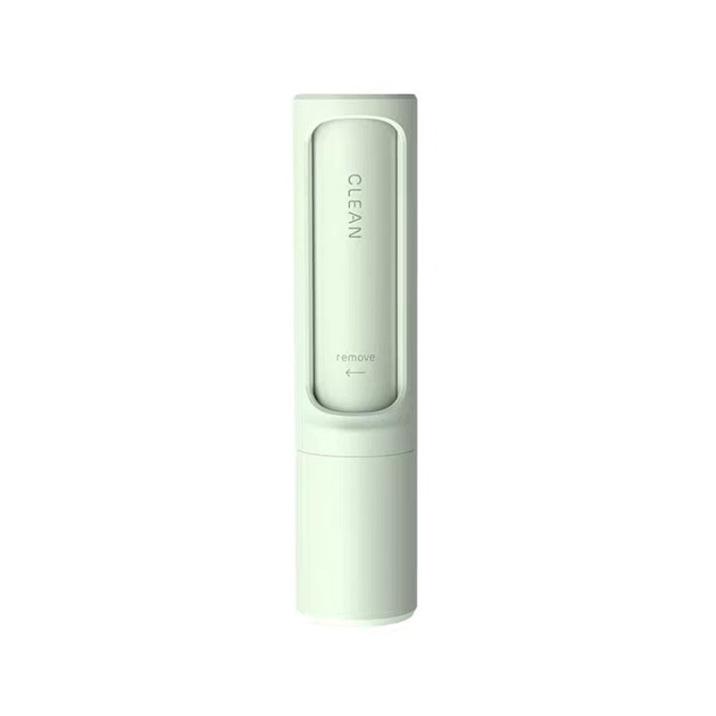 Mint green Lint Roller with 'CLEAN' branding on a white background